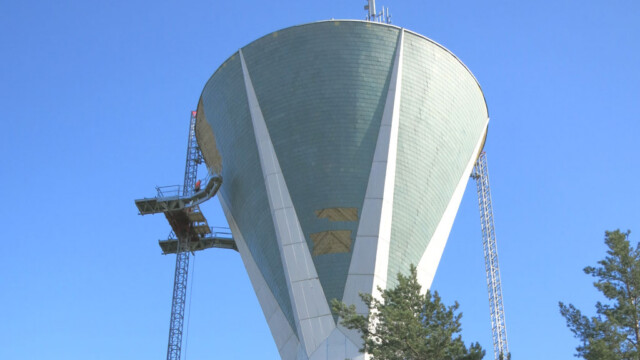 work platform snake extension on water tower